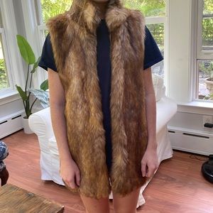 Brown sable vest with pockets and and open front. OS